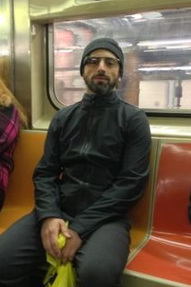Sergey Brin wearing Google Glass in Subway
