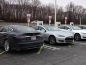 Tesla cars charge on their roadtrip.