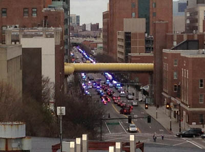Police cars lined up outside Boston hospital for officer Collier