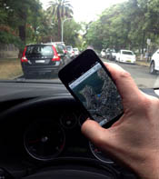 Illegal to use map on phone while driving in California.