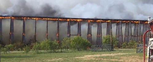 Texas railroad bridge collapses after fire