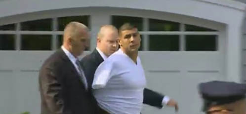 Hernandez in handcuffs