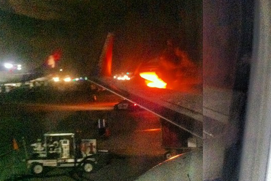 Plane on fire at LAX